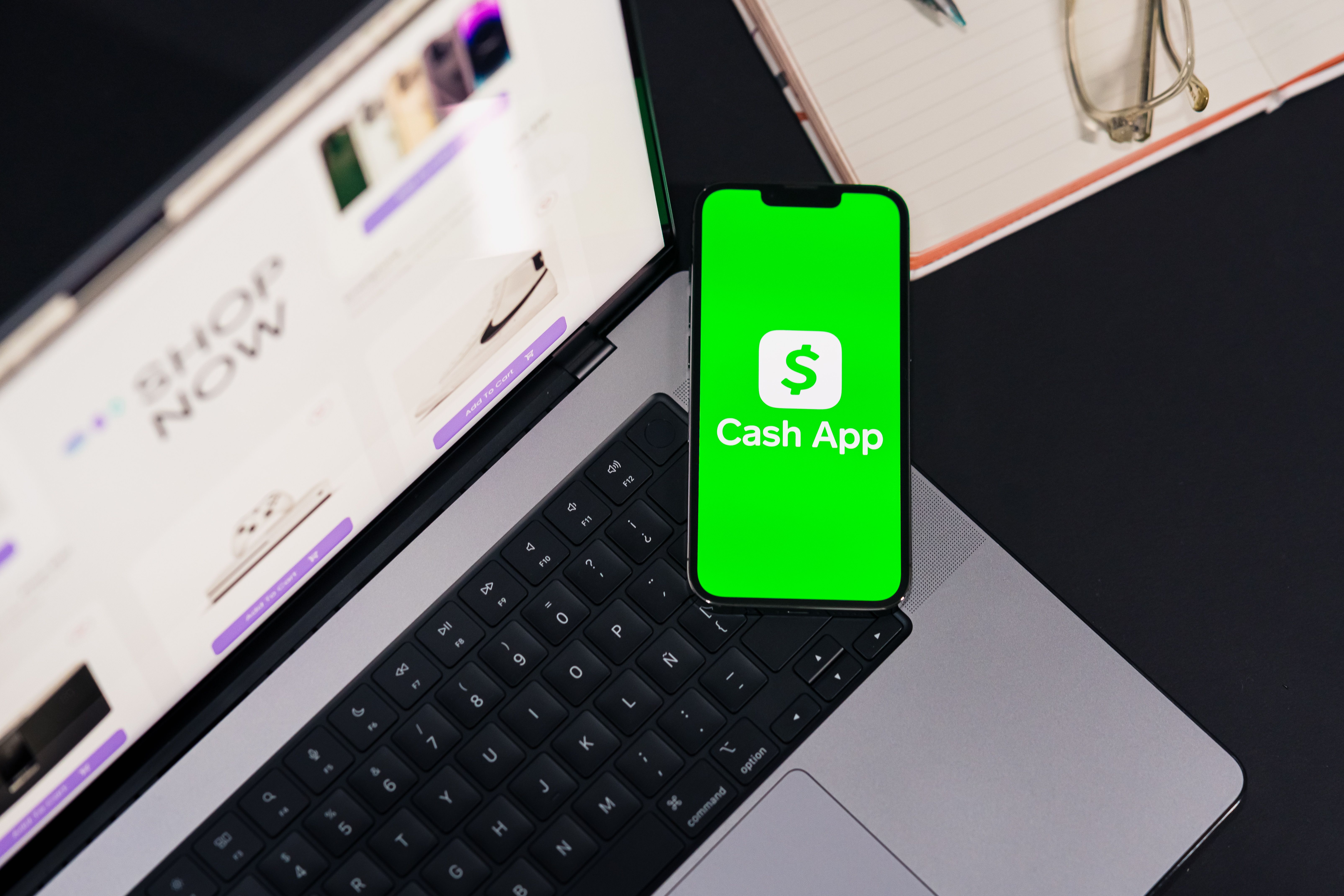 Smartphone showing a Cash App money transfer screen for online payments
